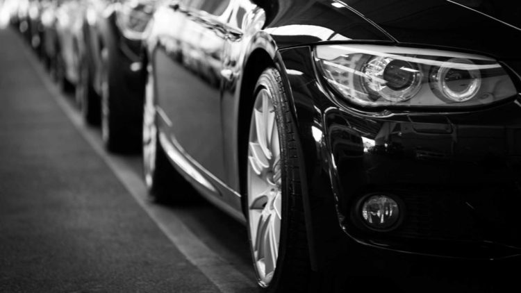 White Rims on a Black Car